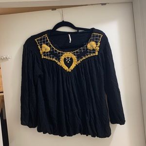 Black top with knit detailing